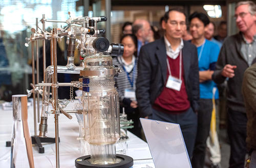 crowd in front of glass shop display