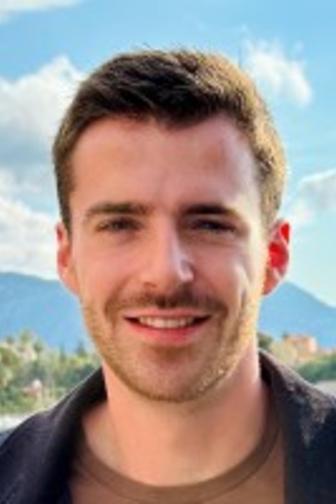 Headshot of Clarke Hardy.