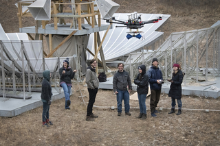 Newburgh group using drone for radio telescope beam calibration at Brookhaven National Laboratory.