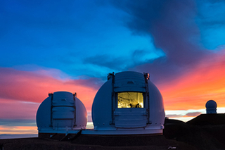 Keck telescopes at sunset.
