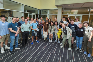 Group of 2024 Summer Program Students posing for a picture at Wright Lab.