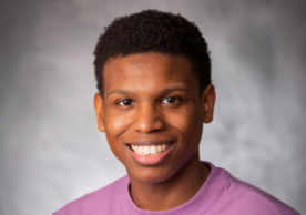 headshot of Evan Craft.