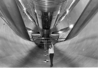 person inside accelerator tank.