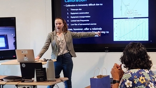 Lady presenting at event