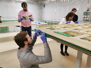People working on DUNE charge readout plane at Yale's Wright Lab.