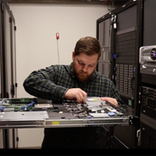 person working on computer server